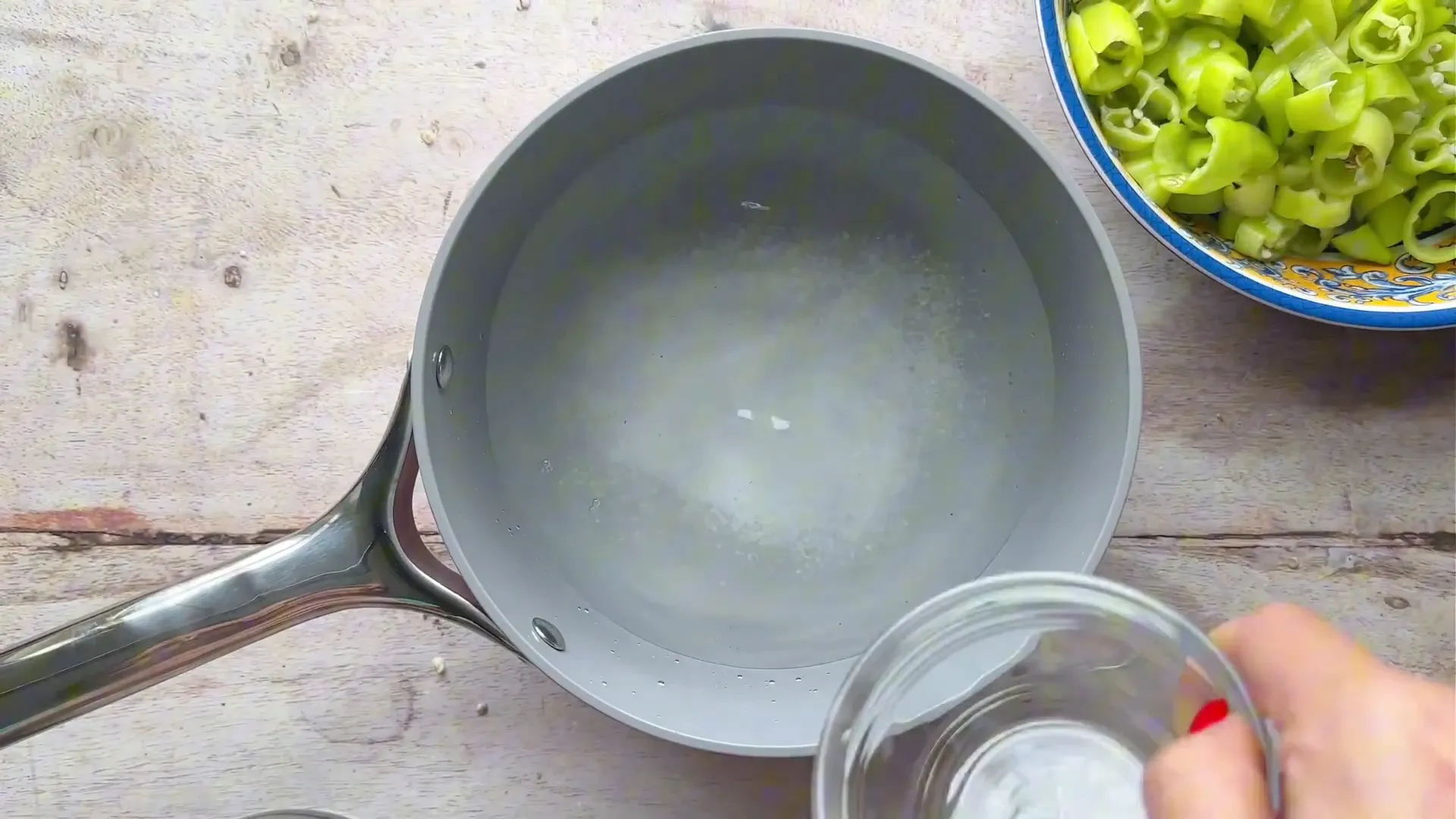 Brine mixture simmering on the stove with garlic