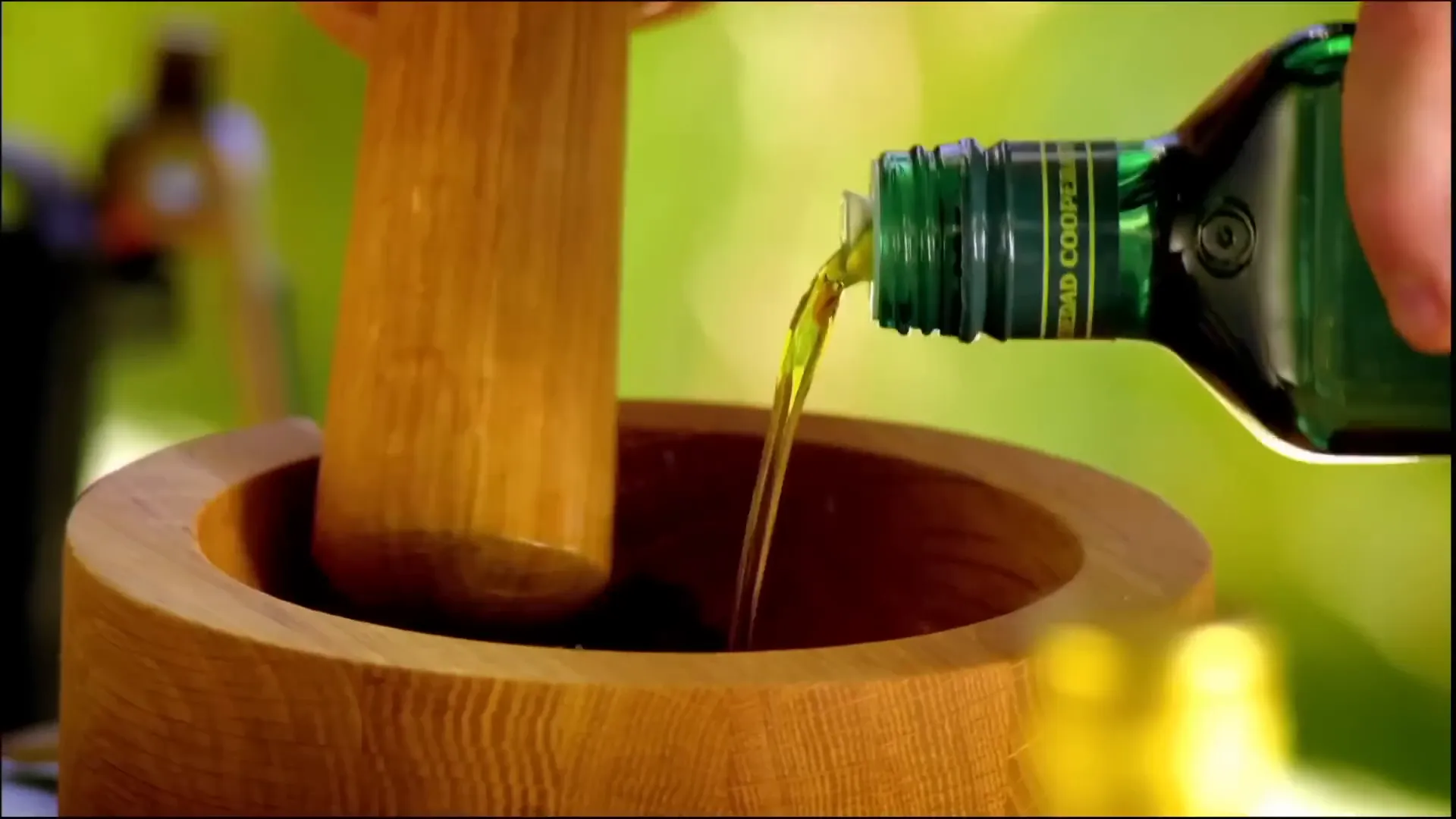Raisin and oregano paste being mixed with sherry and olive oil