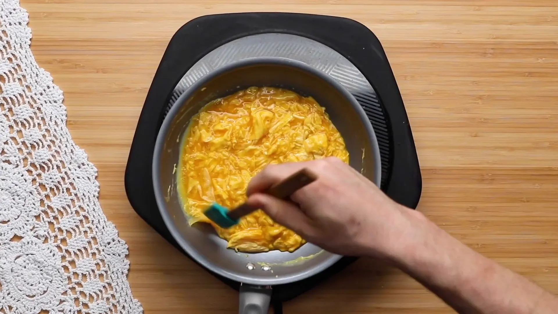 Rolling a French omelet in a nonstick pan