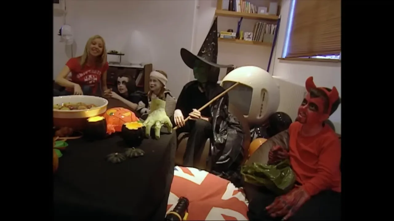 Kids in Halloween costumes ready for trick-or-treating