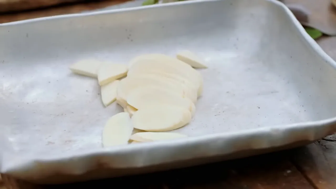 Thinly sliced parsnip and potatoes ready for the tray