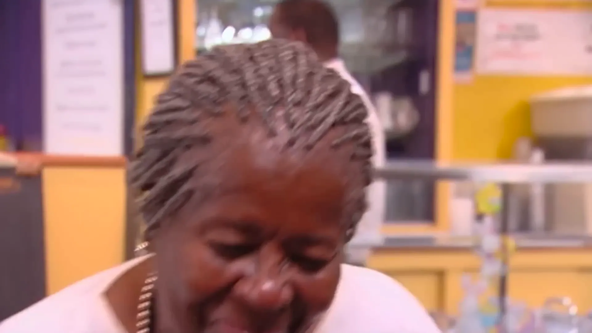 Happy diner enjoying delicious red velvet cake