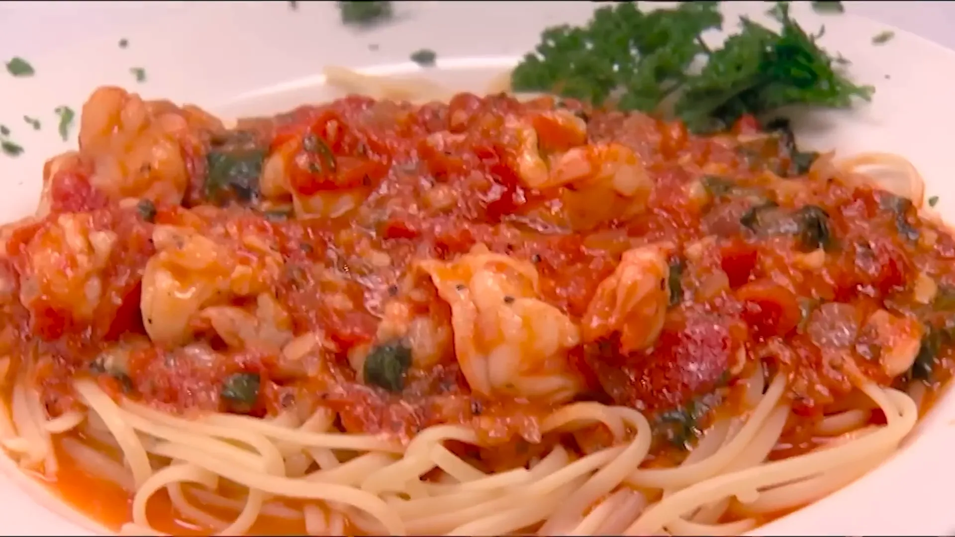 Rubbery shrimp in bland sauce