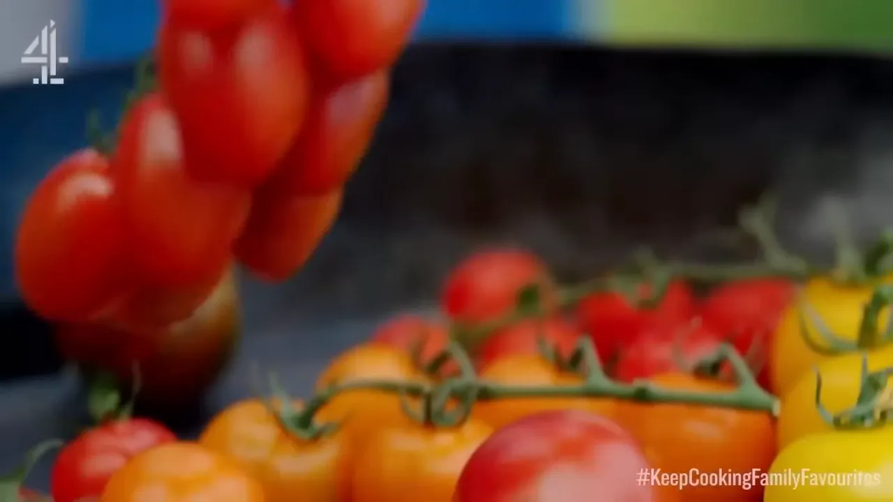 close-up of vine tomatoes over a hot pan, ready to be charred