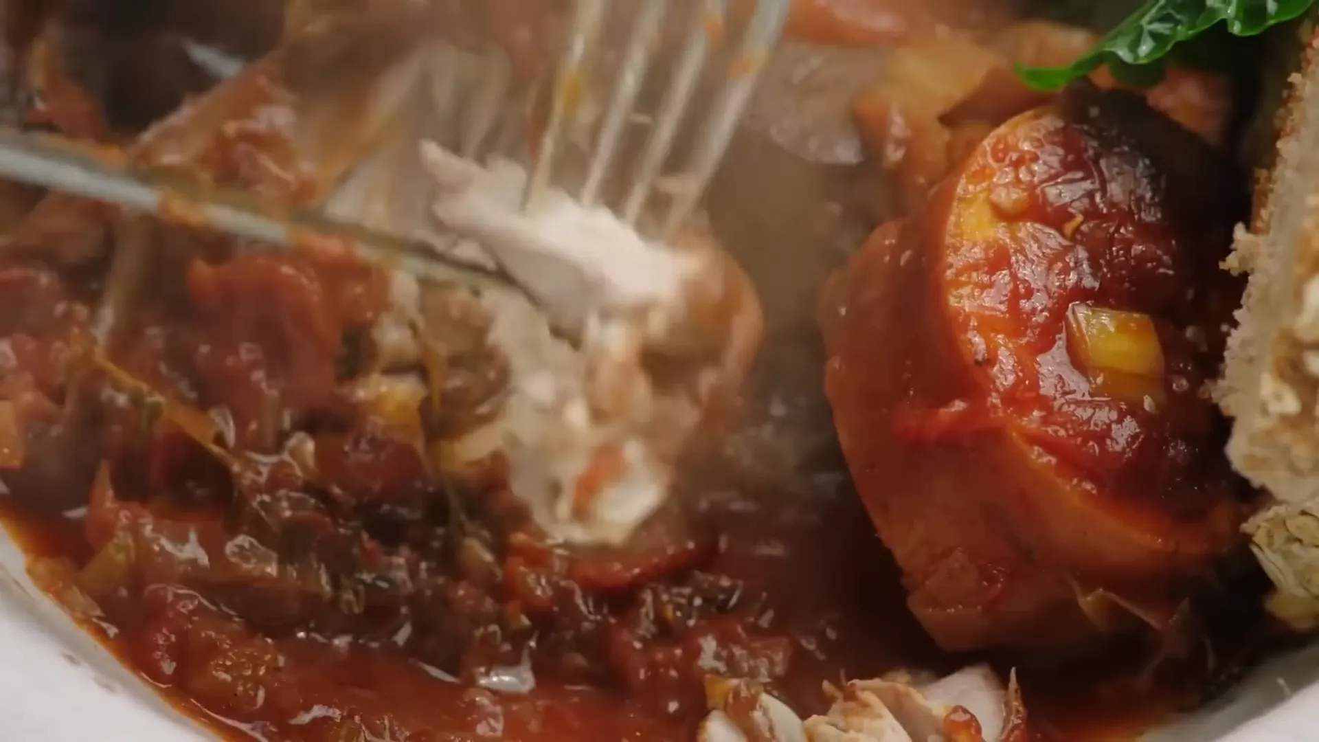 Chicken thighs sizzling with sweet potato and mushrooms in a casserole