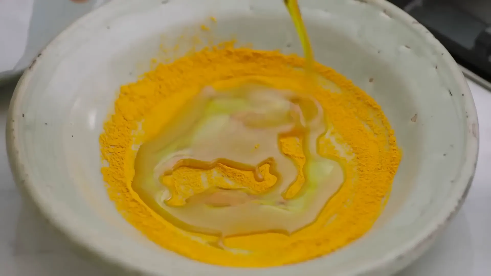 Turmeric marinade with olive oil and oregano ready for chicken