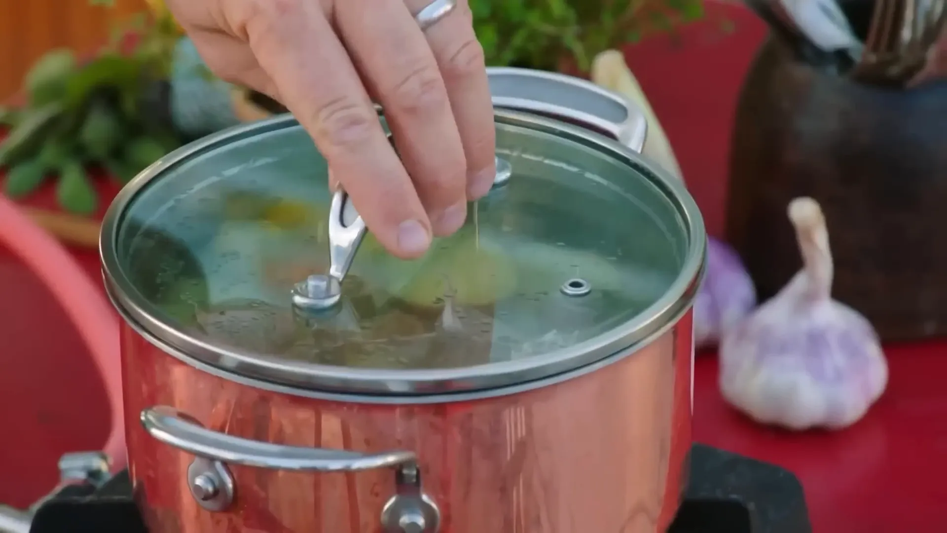 Red skin potatoes parboiling with garlic
