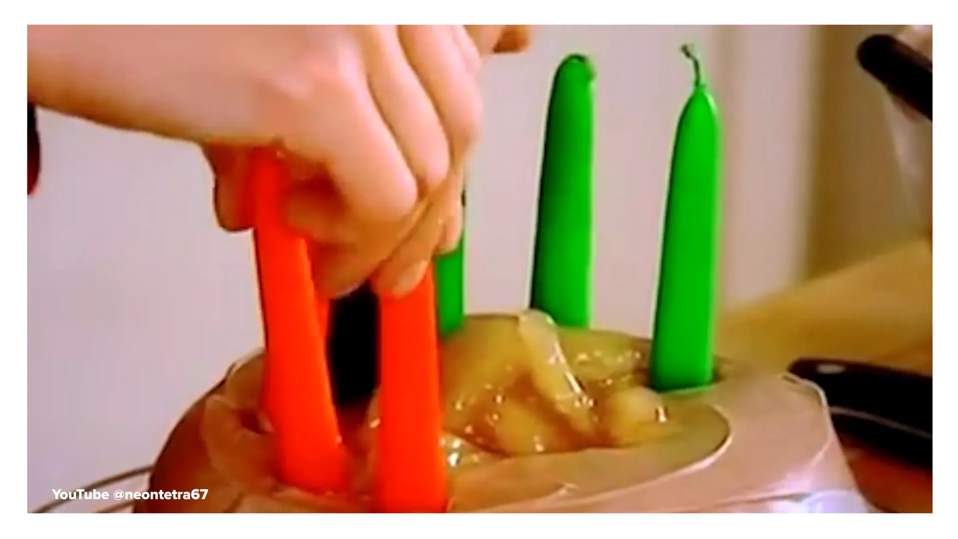 Candles on the cake representing Pan African flag colors
