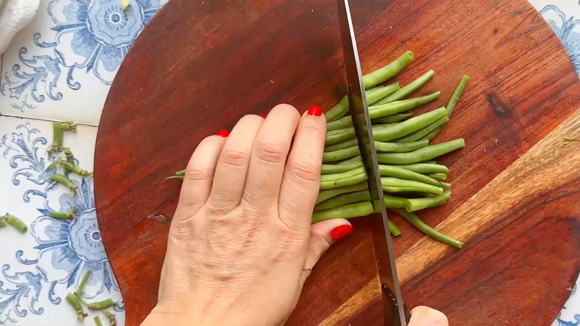 Fresh green beans trimmed and cut into chunks ready to be added to the pot