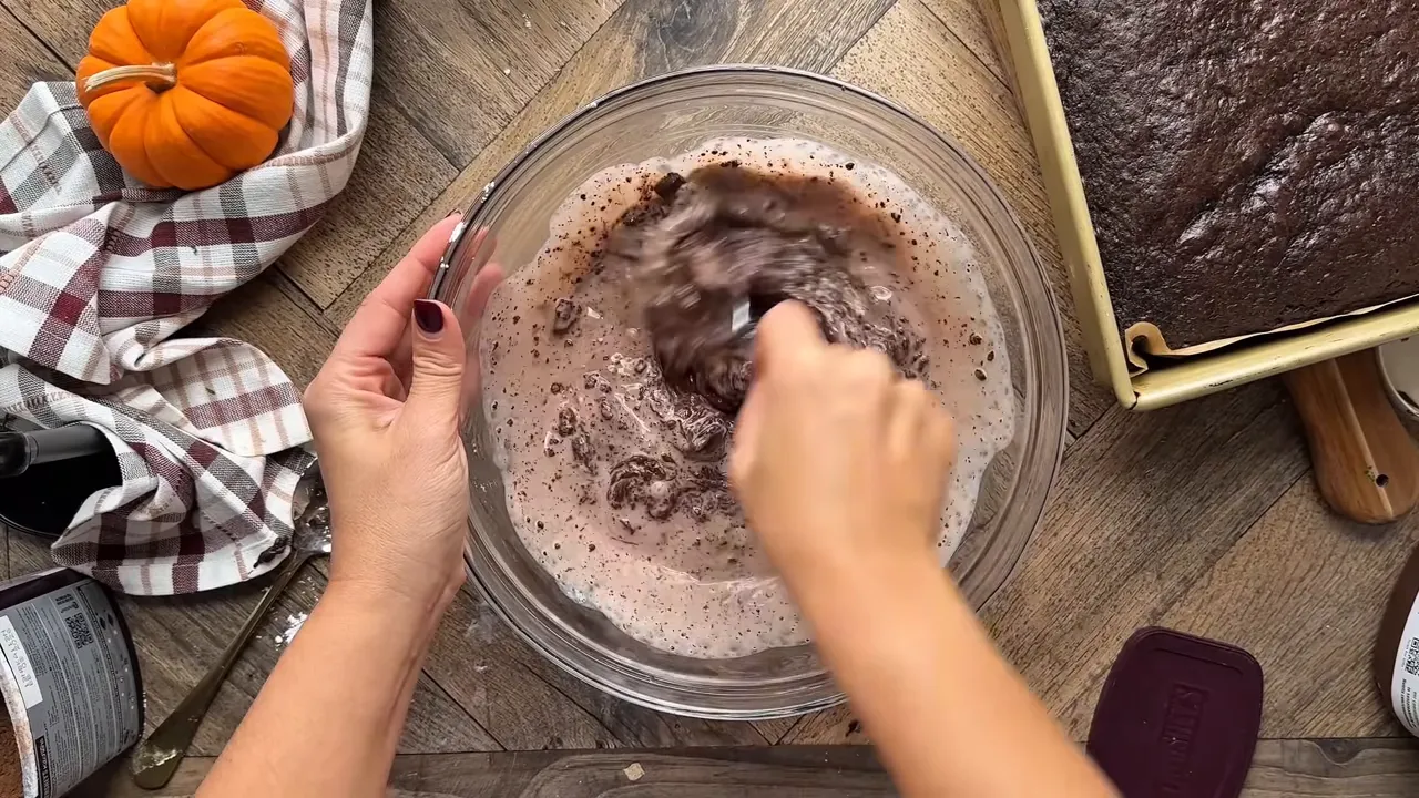 Mixing Nutella ganache in a microwave-safe bowl
