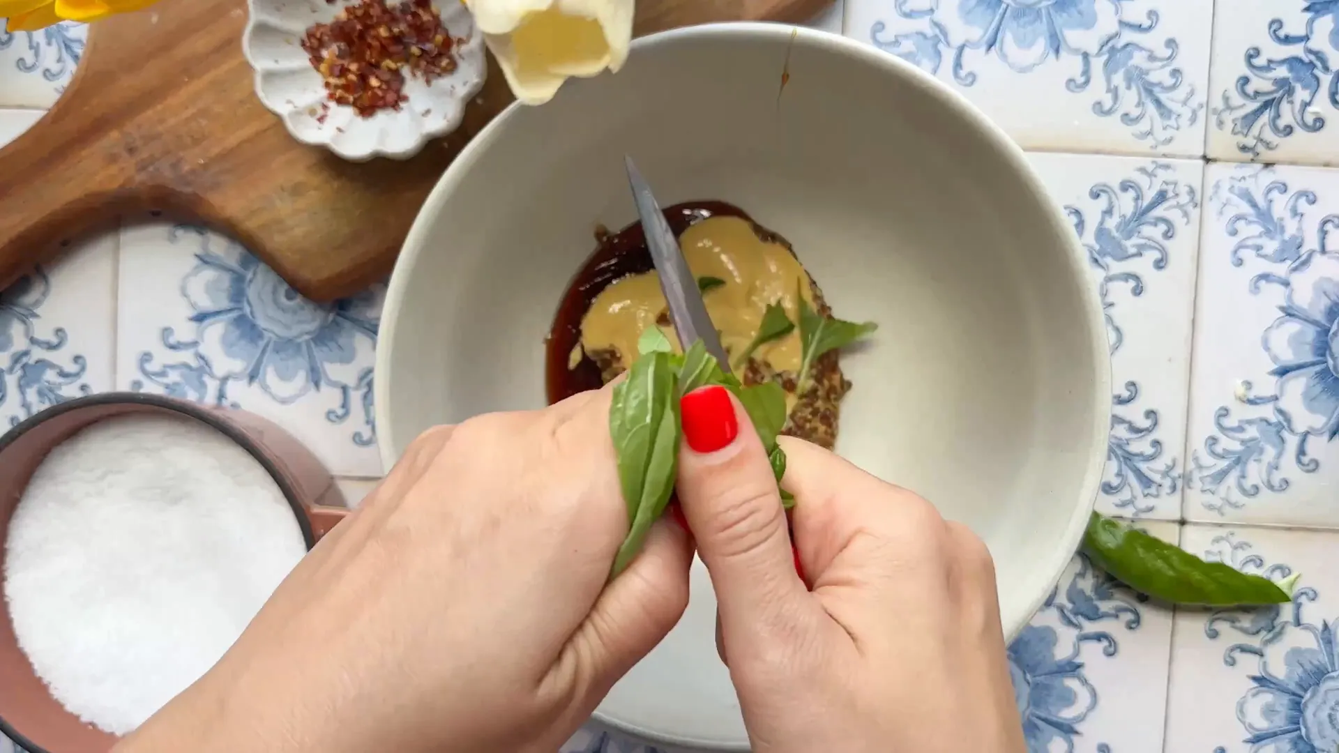 Fresh basil and mustard in a bowl for marinade