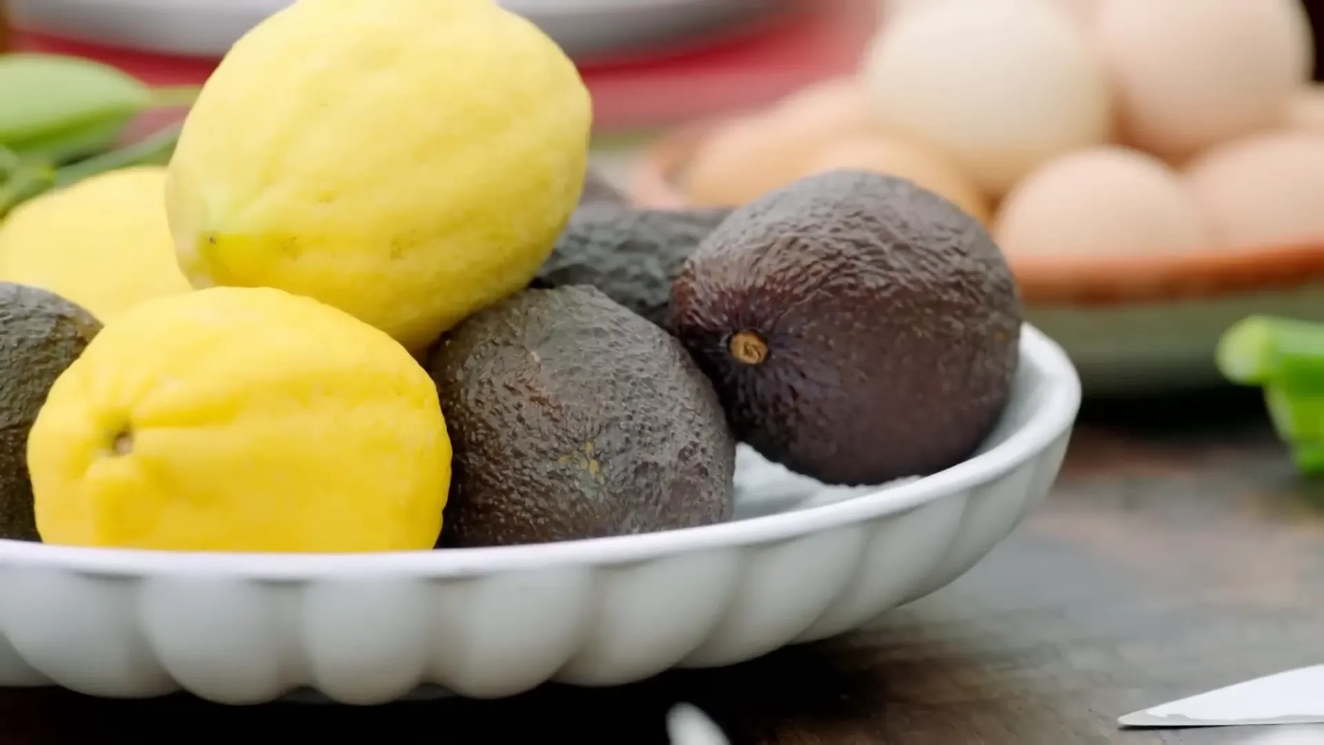 Half a lemon and white wine vinegar ready to be juiced