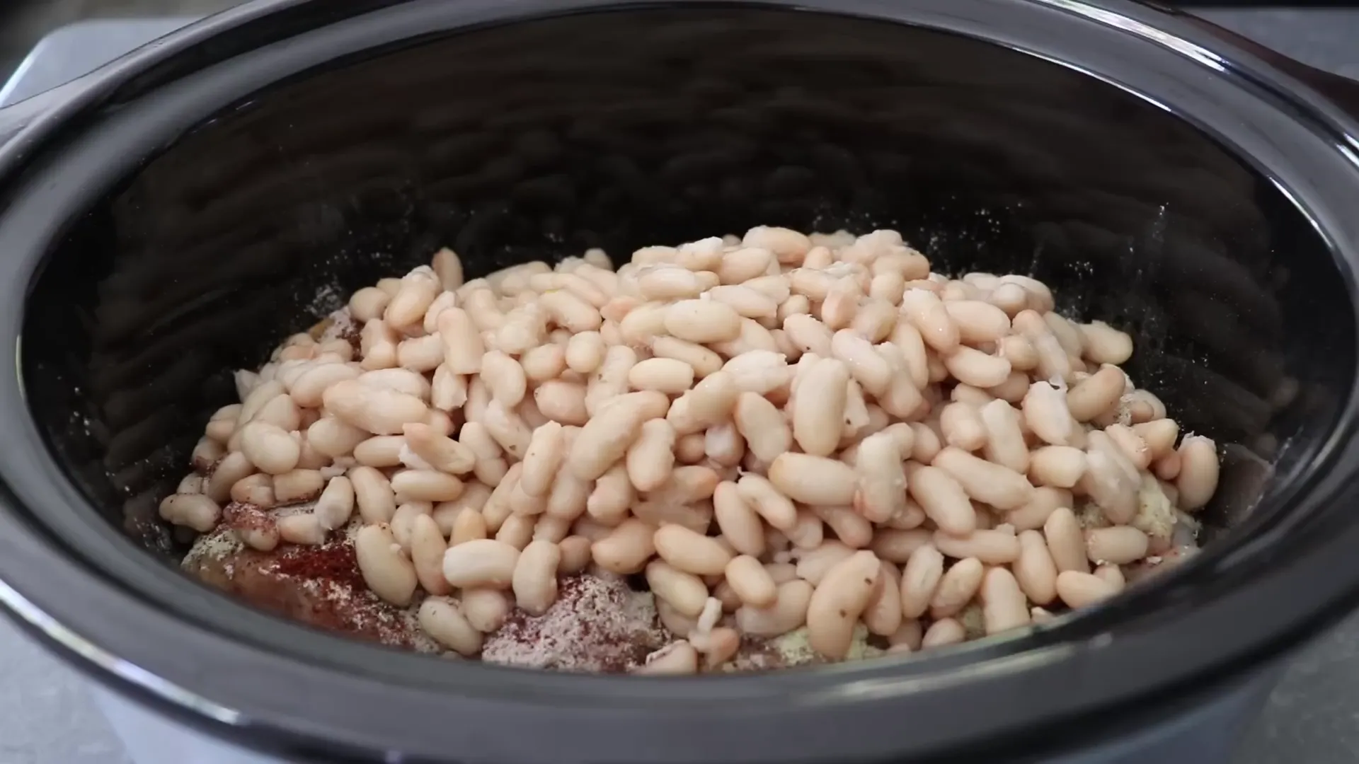 Adding cannellini beans into the slow cooker