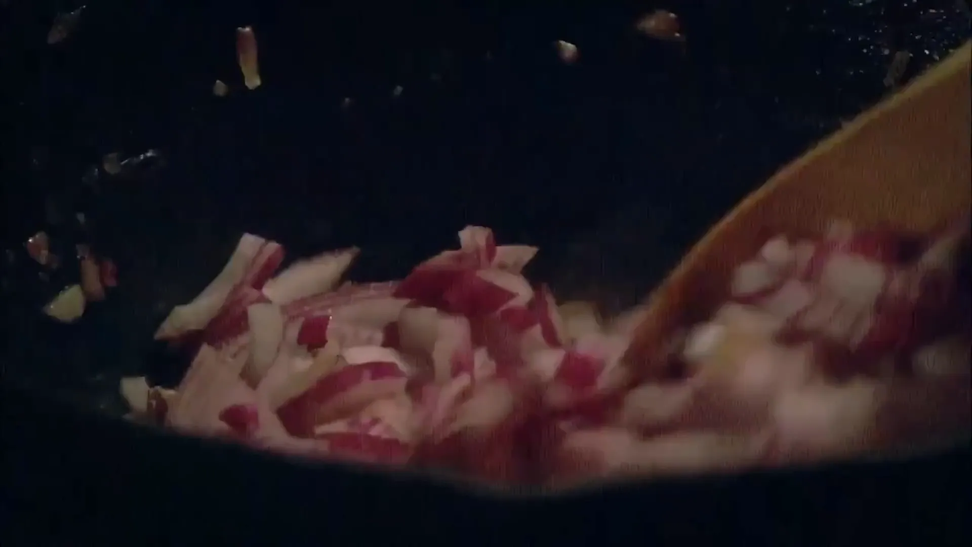 Frying onions, peppers, and garlic for sauce base