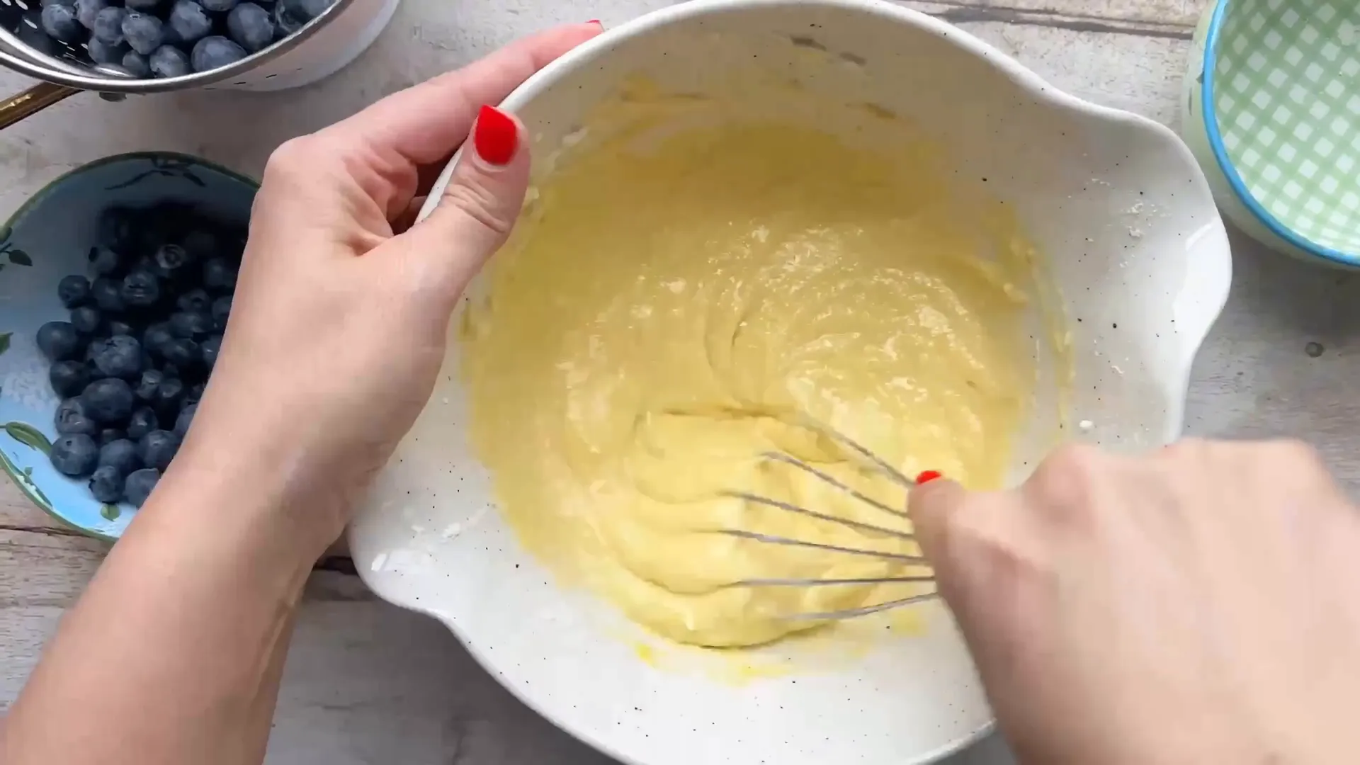 Whisking custard ingredients until creamy