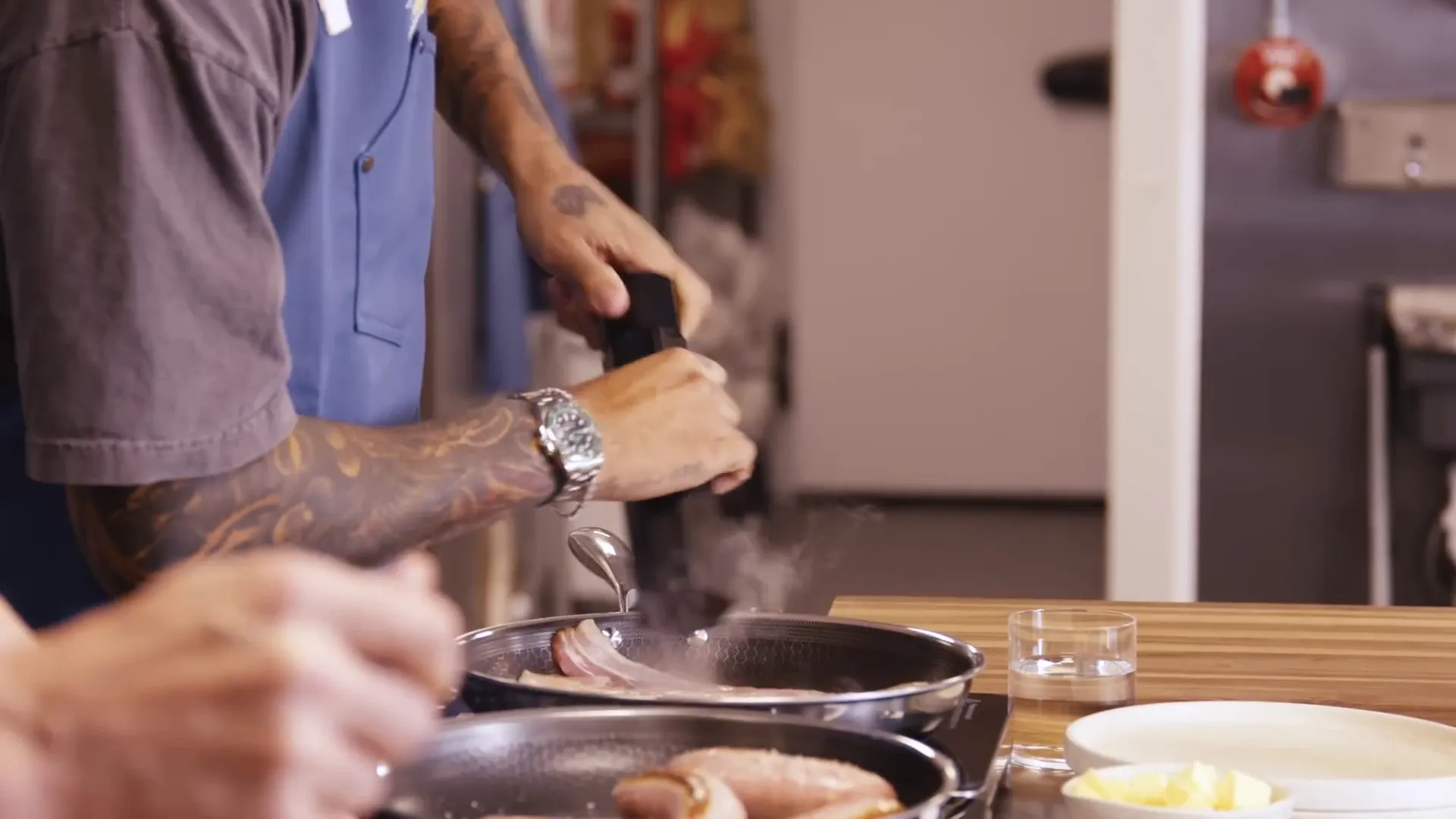 Bacon sizzling in the pan, getting crispy