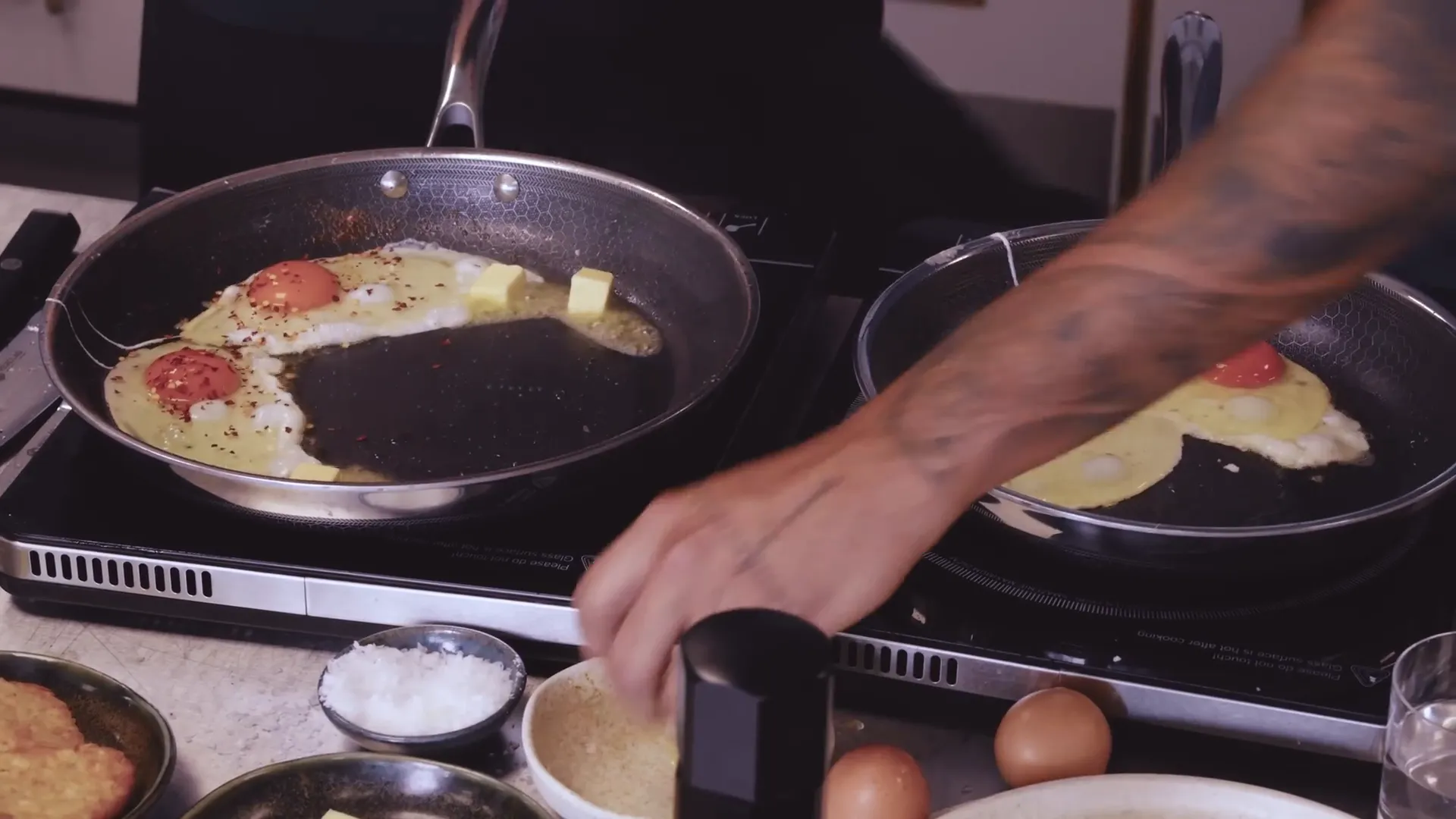 Eggs frying in the pan with butter