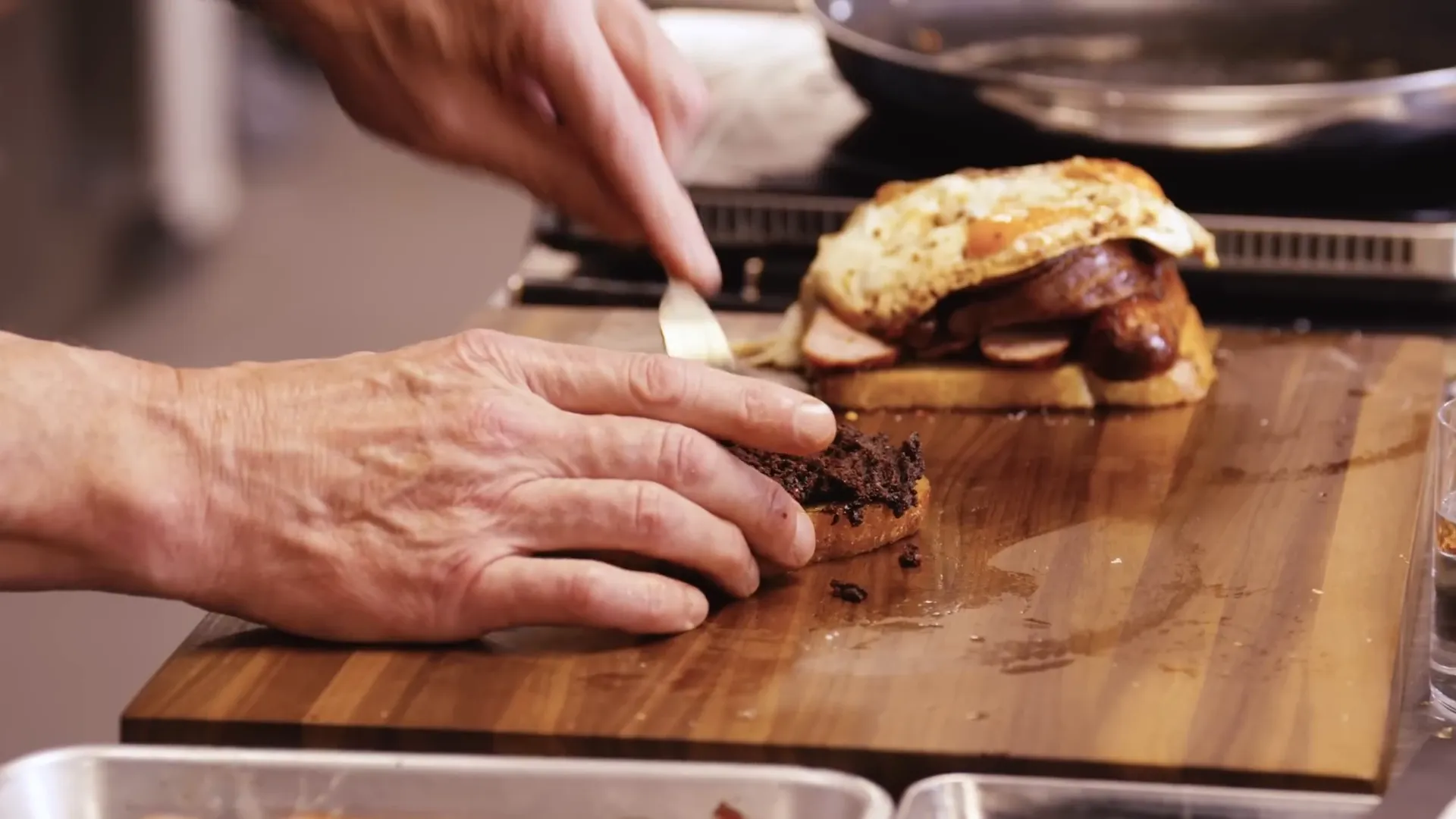 Black pudding spread over the sandwich toast