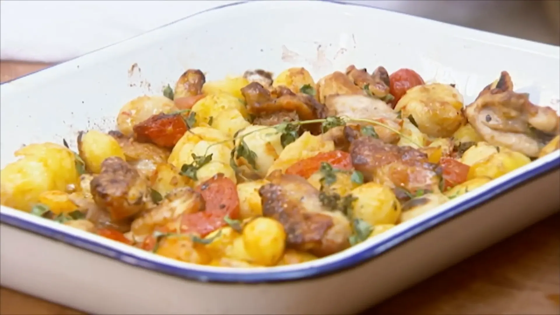 Golden roasted chicken traybake with tomatoes and new potatoes