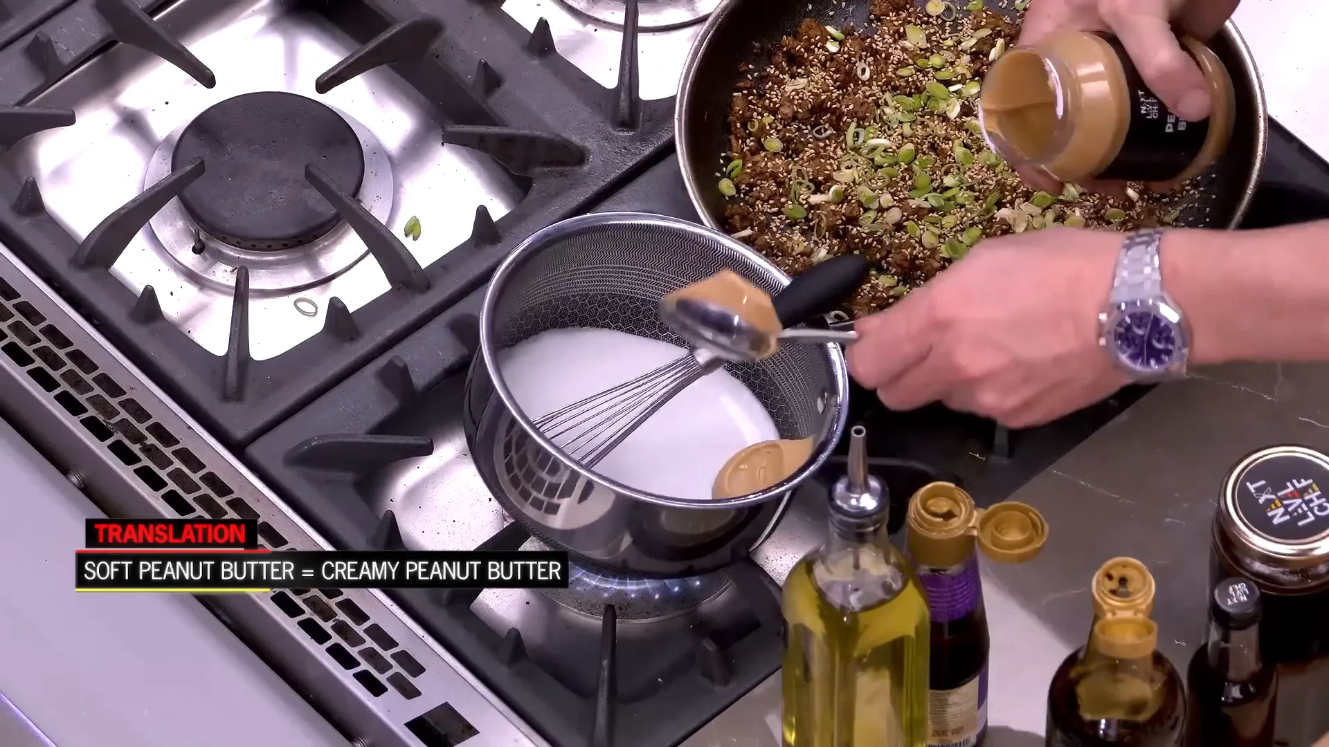 Silky peanut sauce simmering in a pan