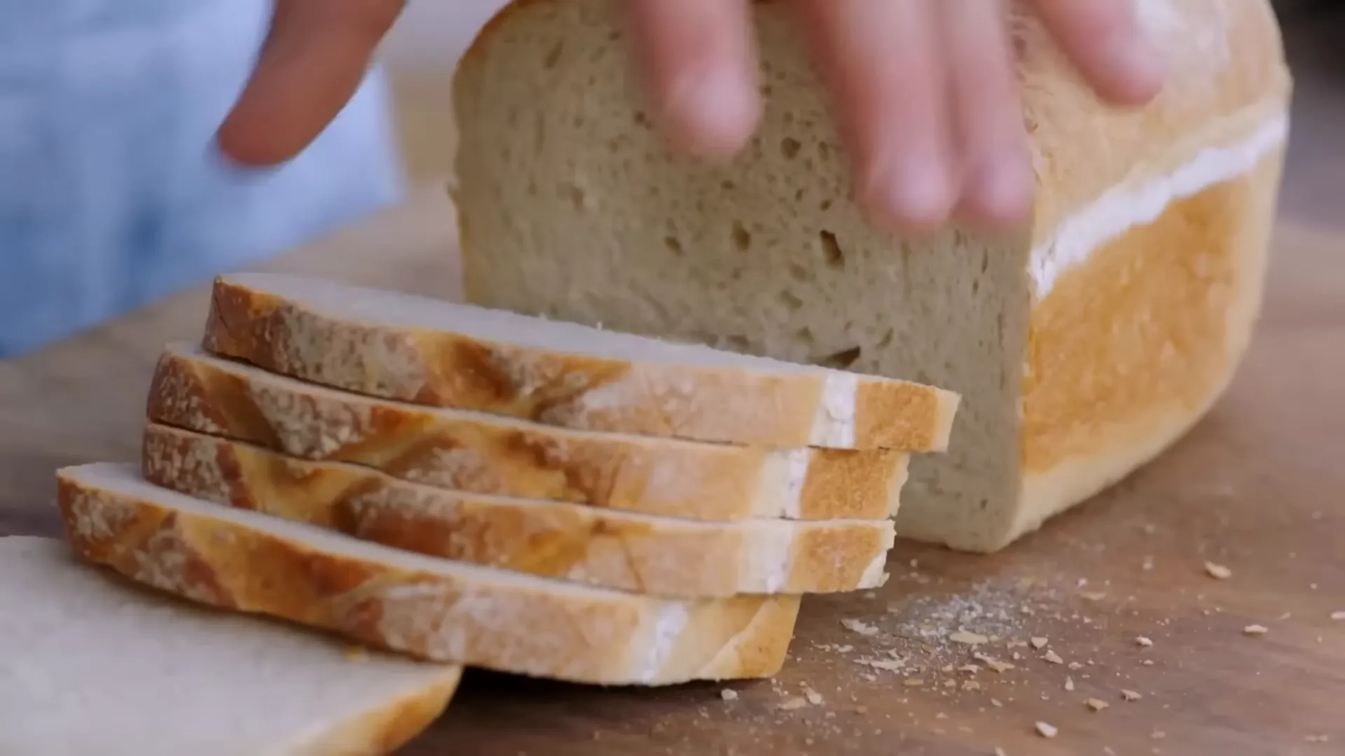 Sliced white bread laid out ready for stuffing