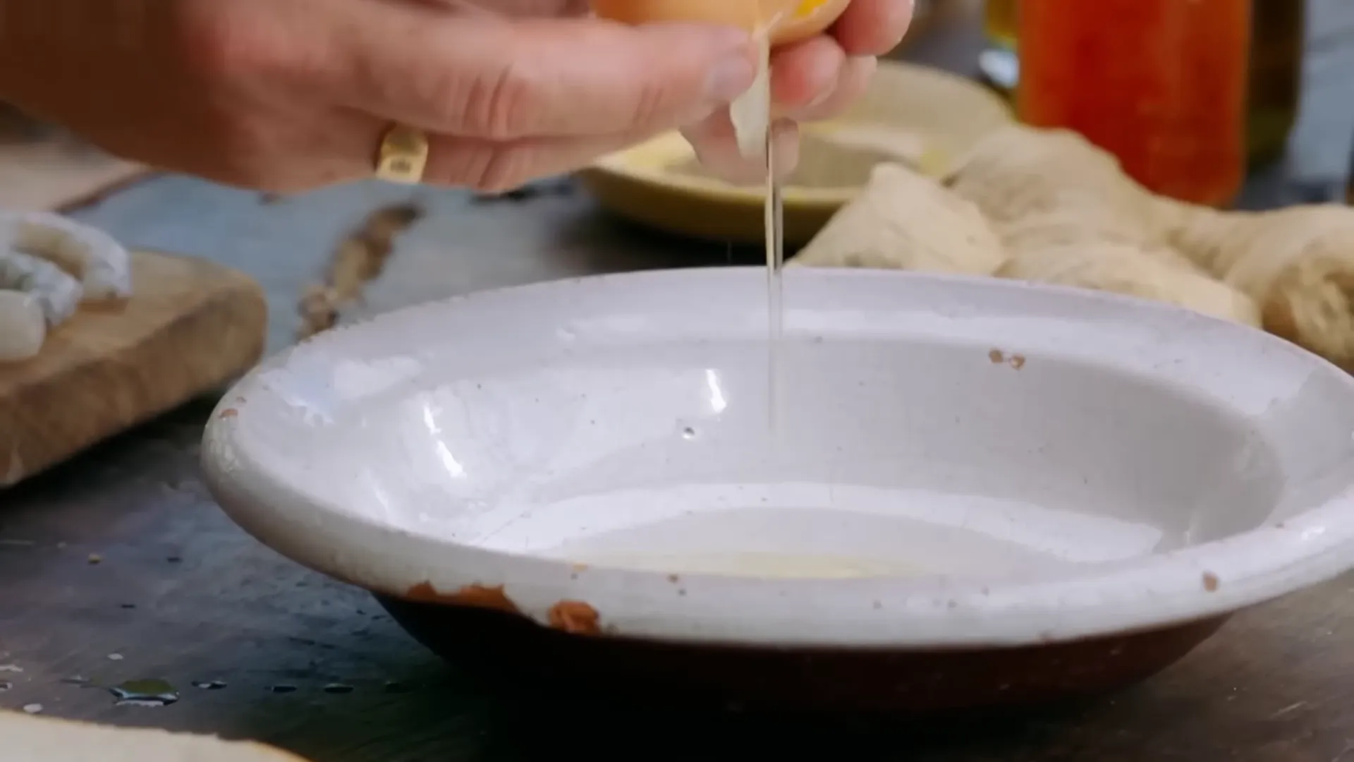 Beaten egg whites used to coat the toastie before sesame