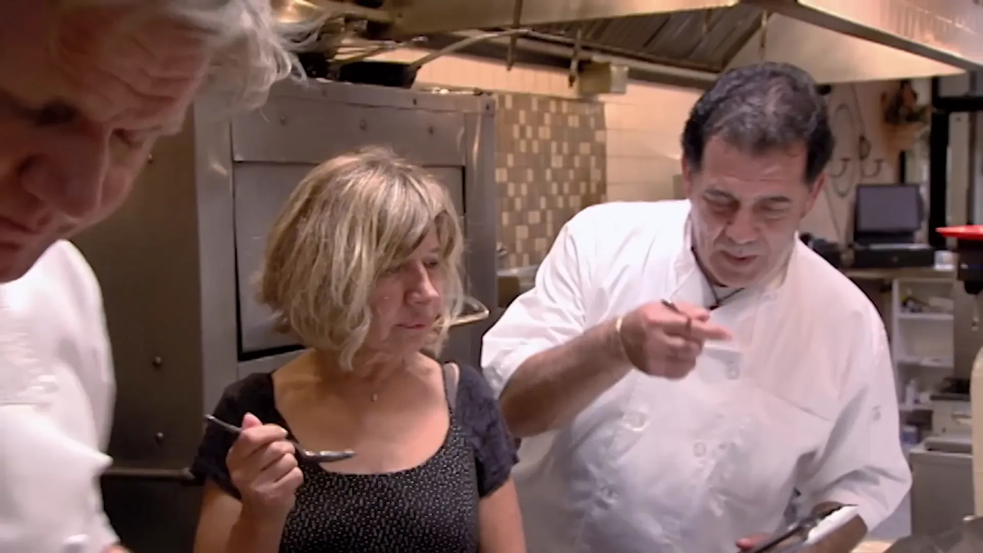 Manny and Christina cooking sea bass together, rekindling their passion