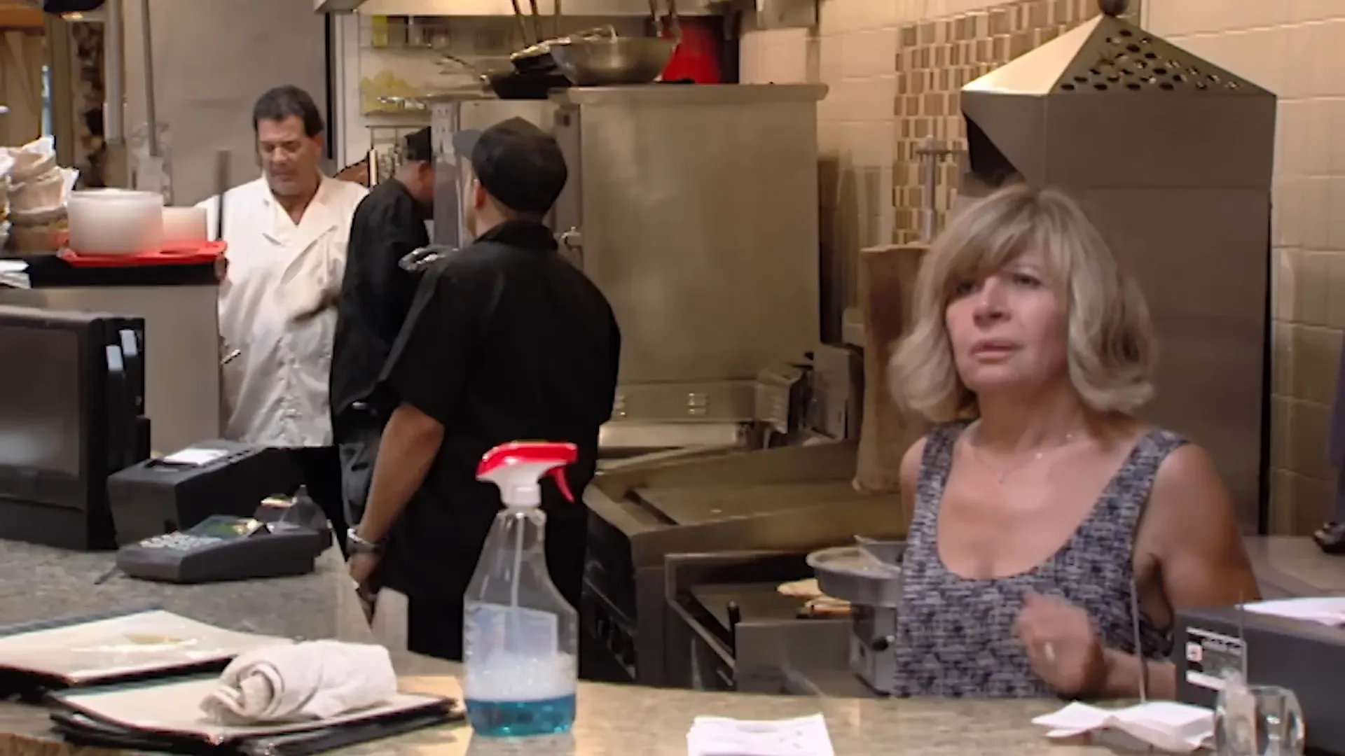 Tense argument between husband and wife owners in the restaurant