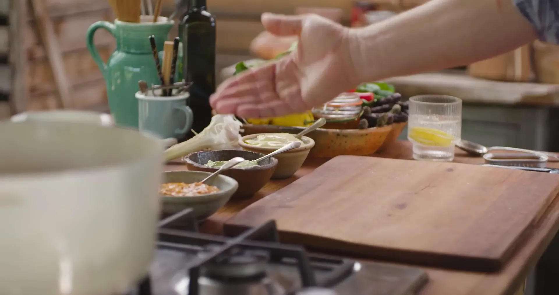 Three flavored mayonnaises: garlic, herb, and harissa