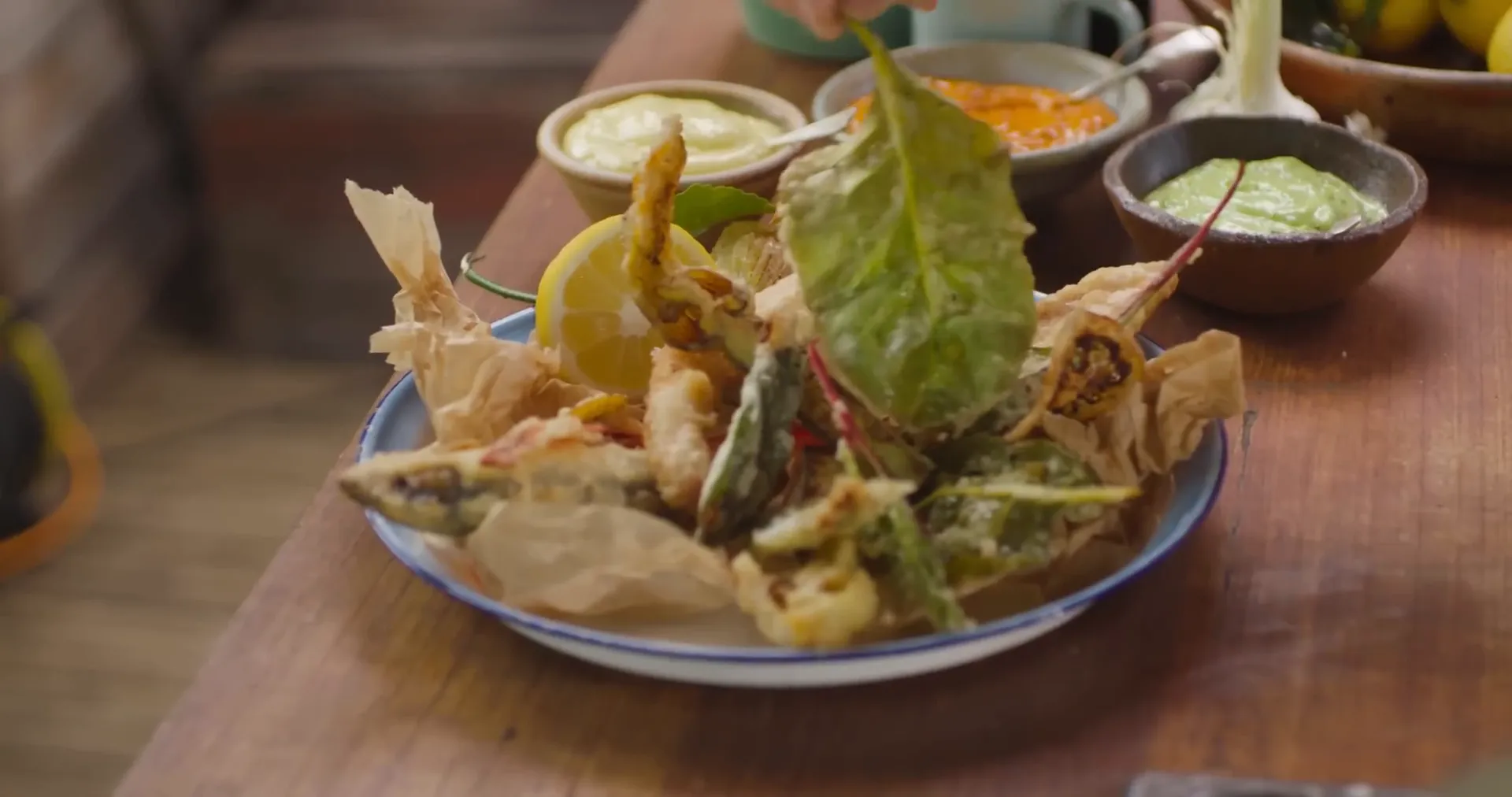Golden fried Fritto Misto served with lemon and flavored mayonnaises