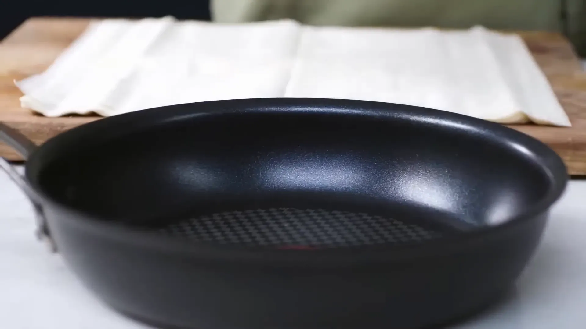 Pan of mushrooms sizzling with garlic and thyme