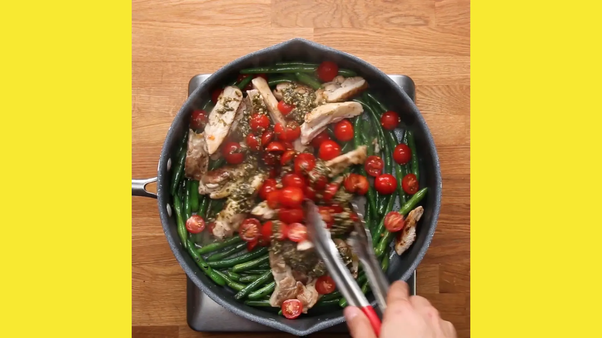 Pesto chicken with colorful vegetables meal prep containers