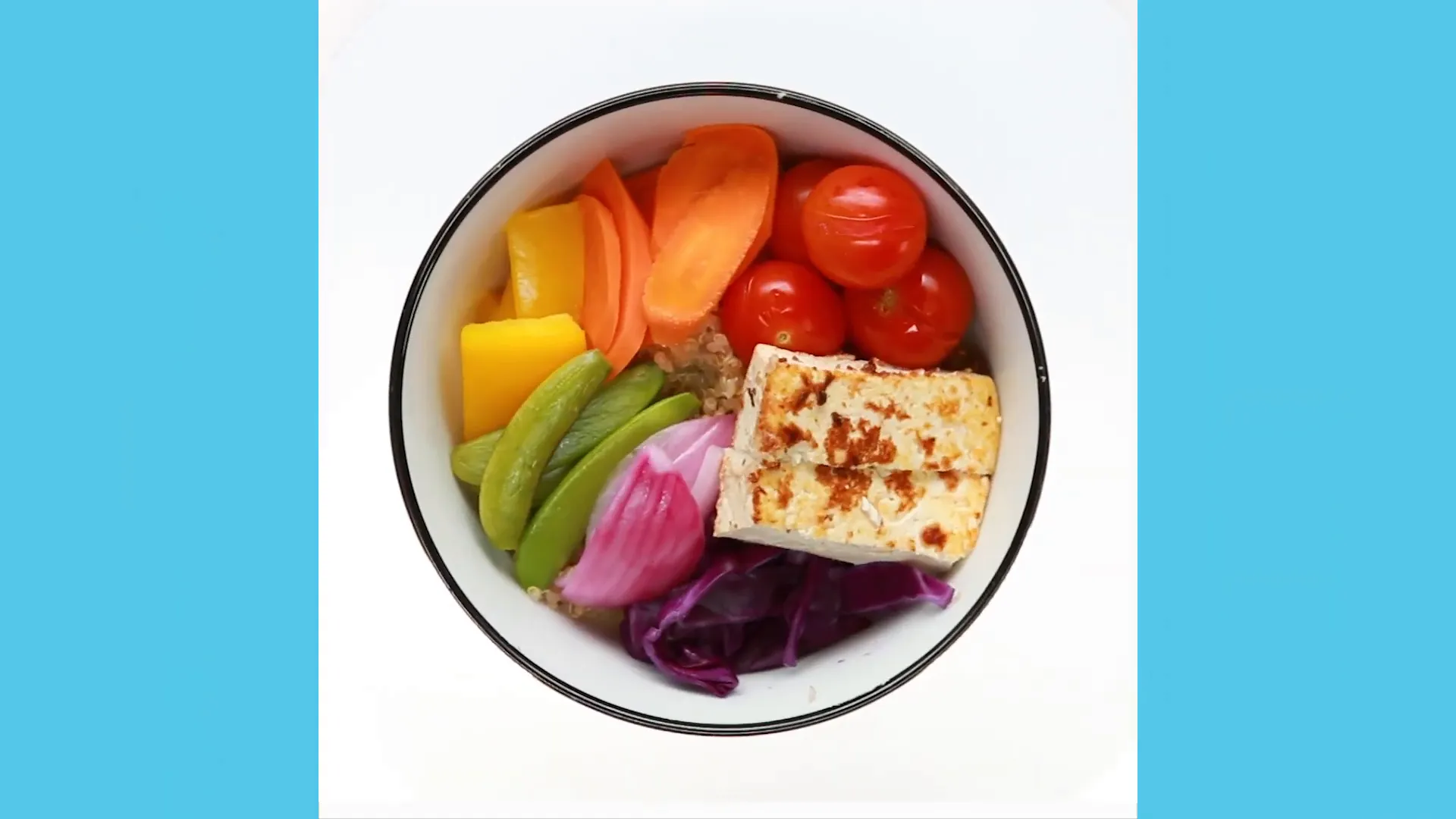 Protein packed rainbow bowl with vibrant vegetables for two