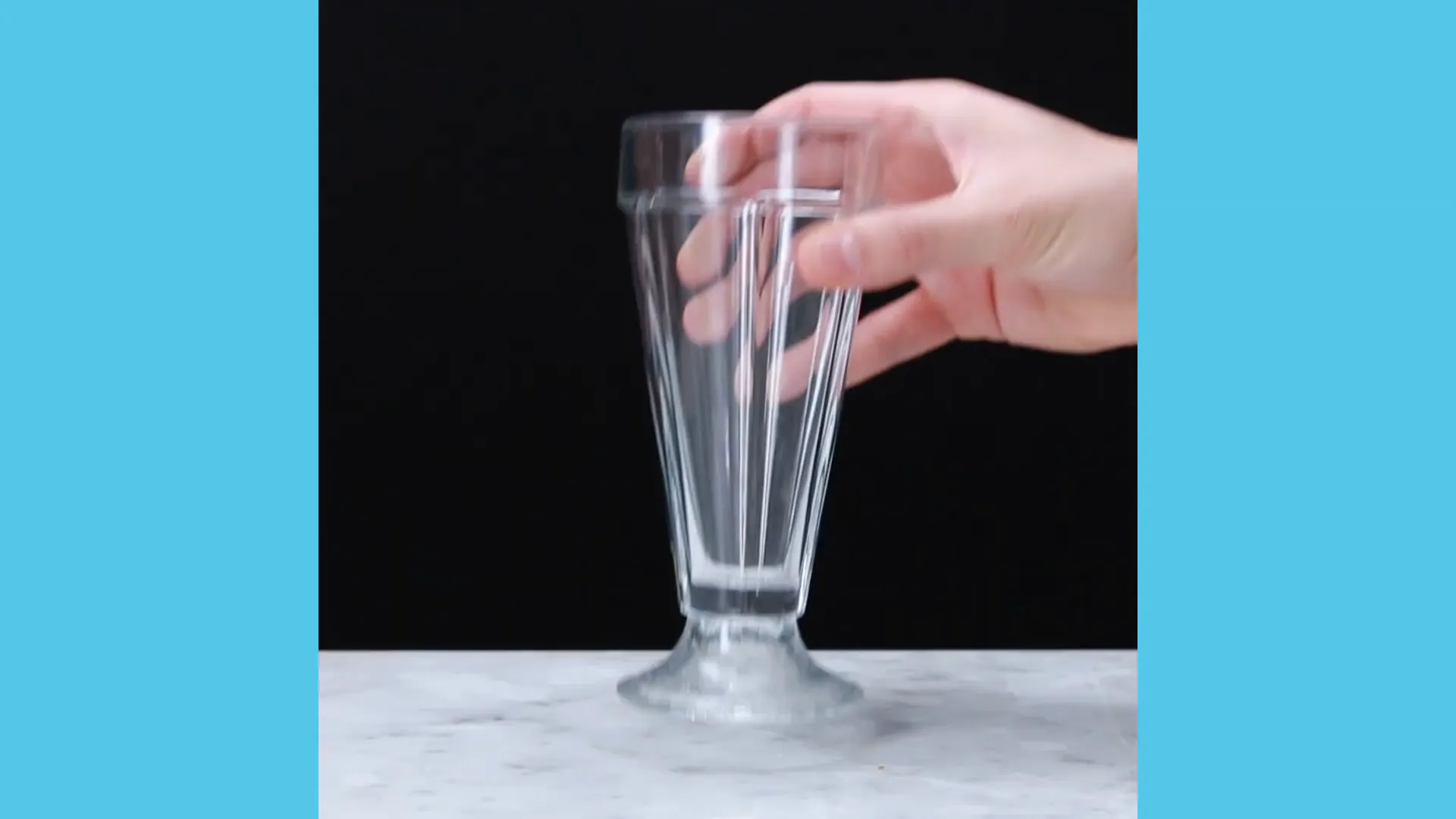 Snickers flavored protein smoothie in a glass