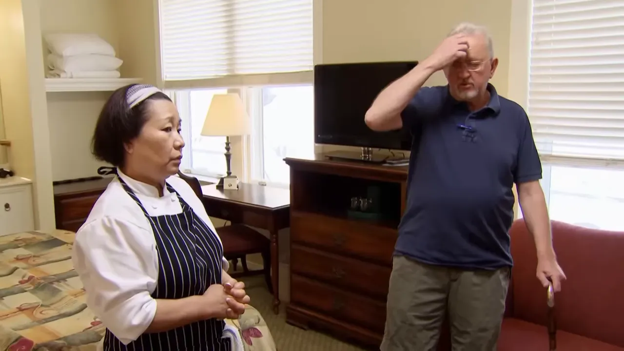 Dated executive king room showing worn furniture