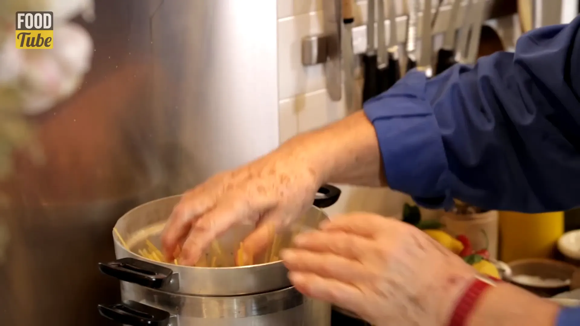Boiling salted water with spaghetti cooking