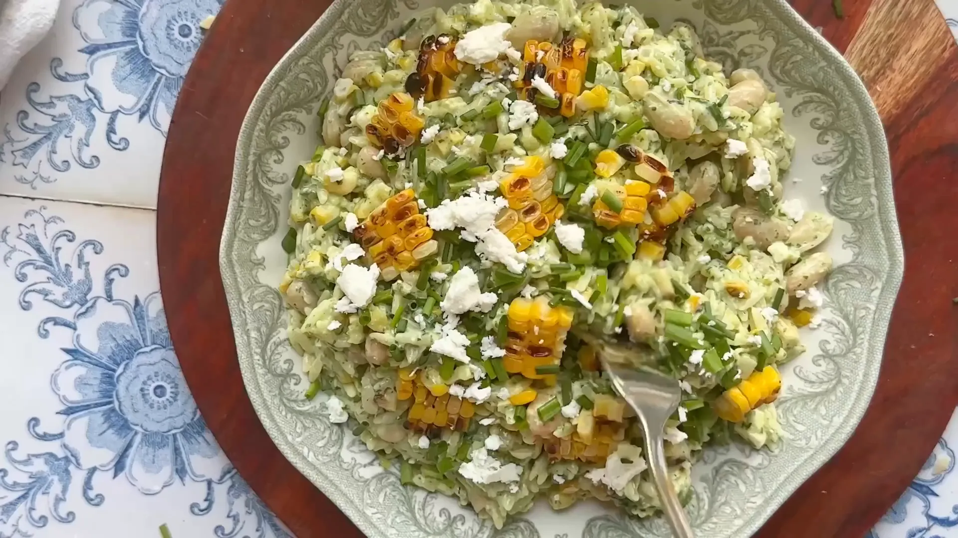 Finished orzo and grilled corn salad ready to serve