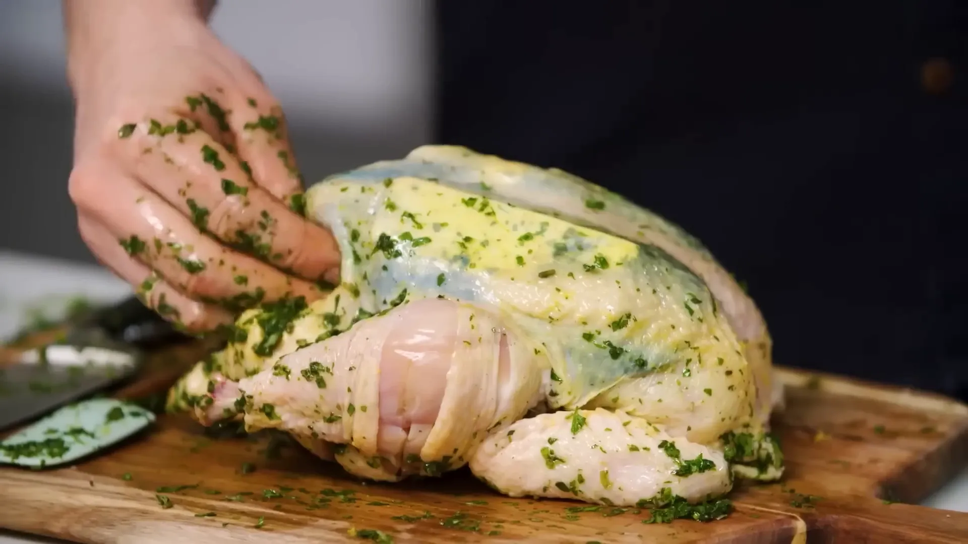 Inserting butter under chicken skin and preparing hot lemon