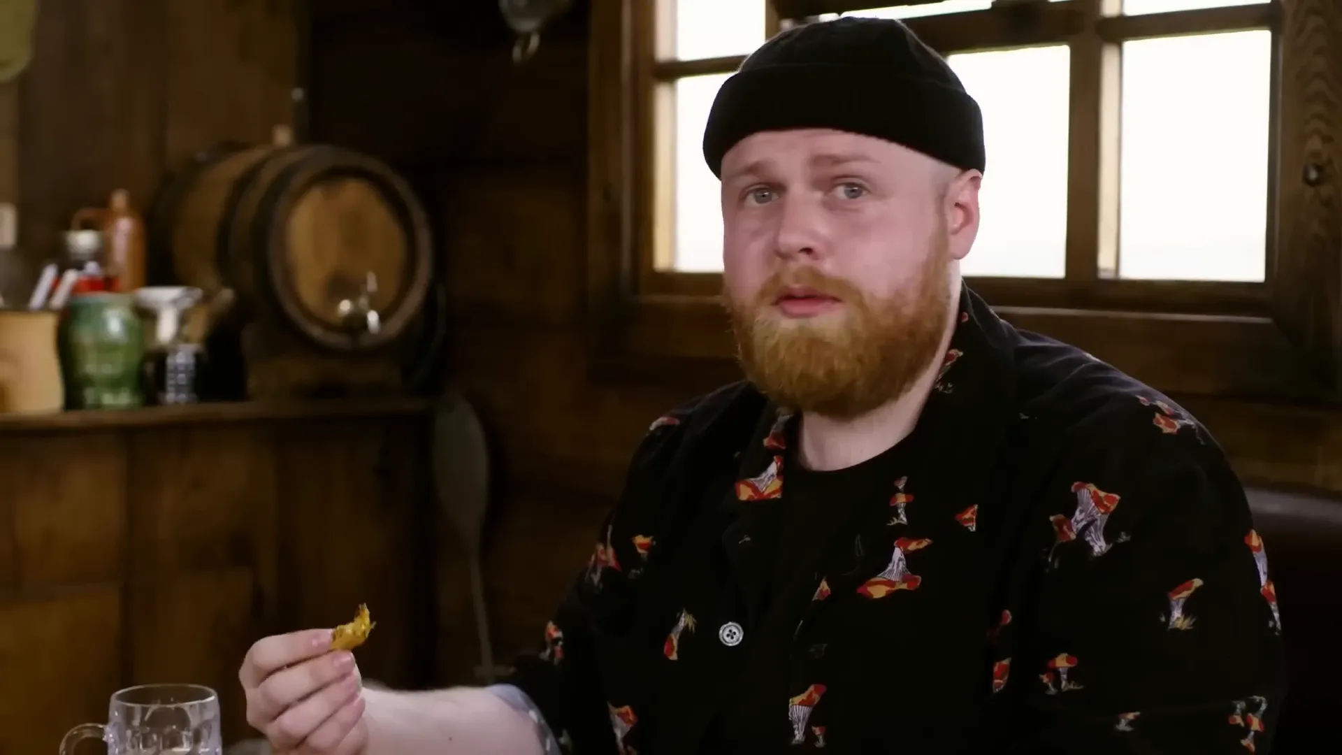 Tom Walker's eyes watering from the intense heat of the hot sauce