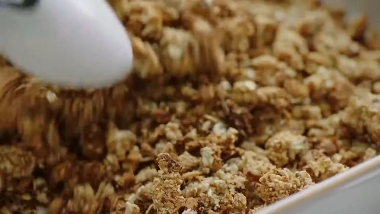 Finished roasted stone fruit crumble with coconut oat topping and yogurt