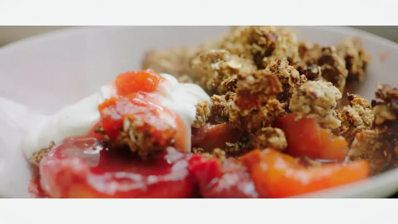 Roasted stone fruit crumble plated and ready to serve