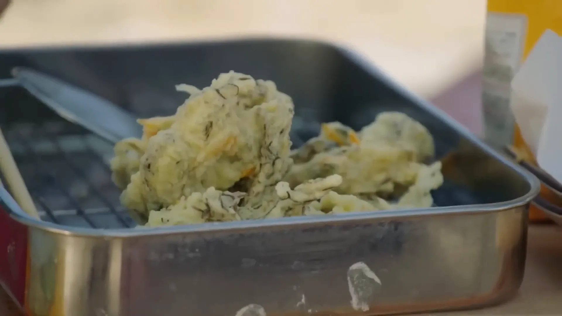 Seaweed tempura being served, crispy and golden