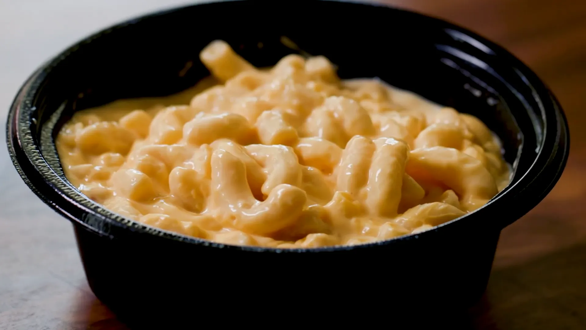 Close-up shot of KFC mac and cheese showing creamy texture