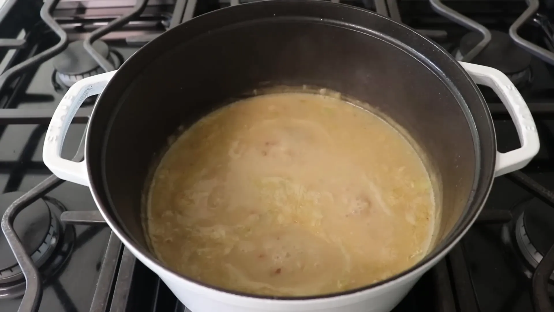 Chowder simmering with vegetables before fresh corn is added