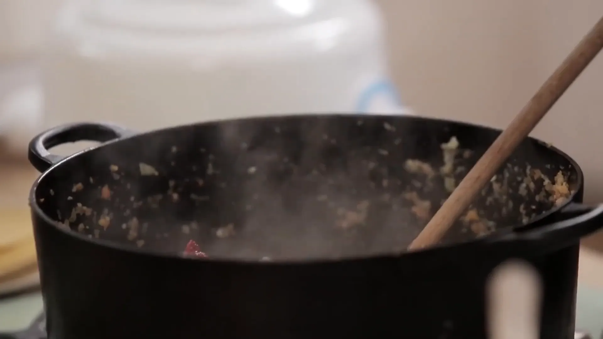 Simmering family ragu in a pot