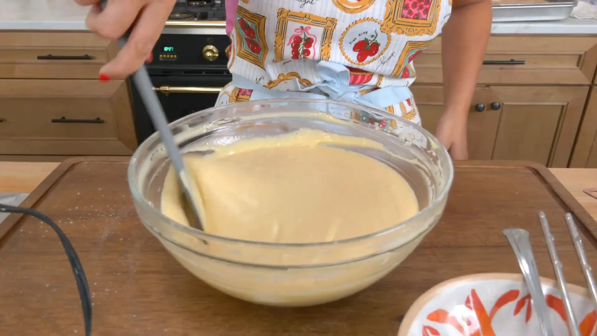 Mixing dry ingredients and limoncello into batter