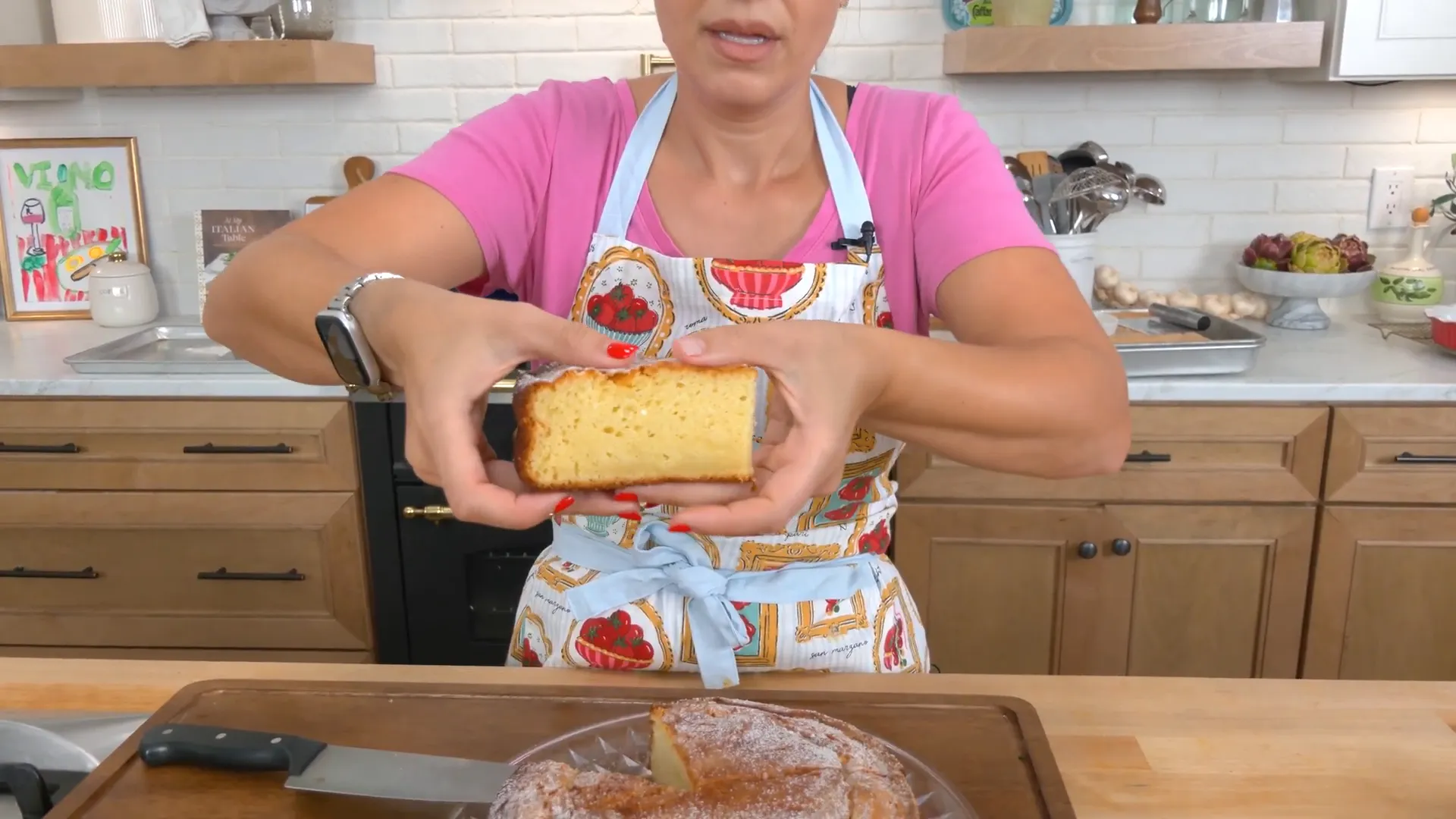 Slice of limoncello ricotta cake showing fluffy texture and golden crust