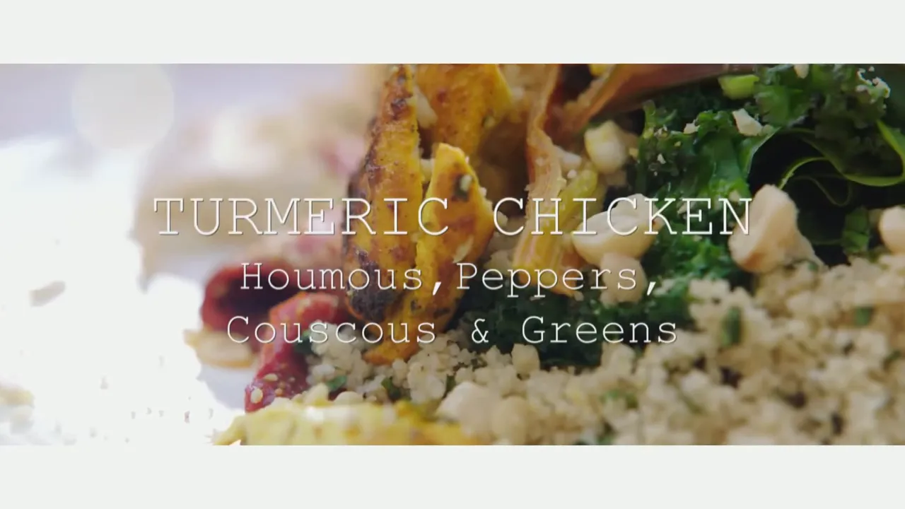 Close-up of plated turmeric chicken with couscous, greens and roasted peppers with overlaid title text