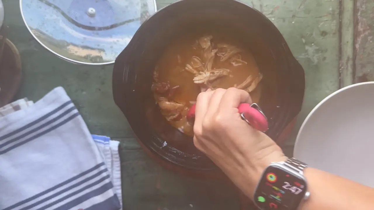 Shredding cooked chicken directly in the crock pot