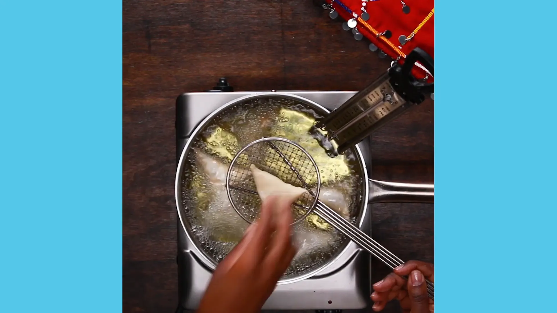 Kenyan Sambusas being prepared with family